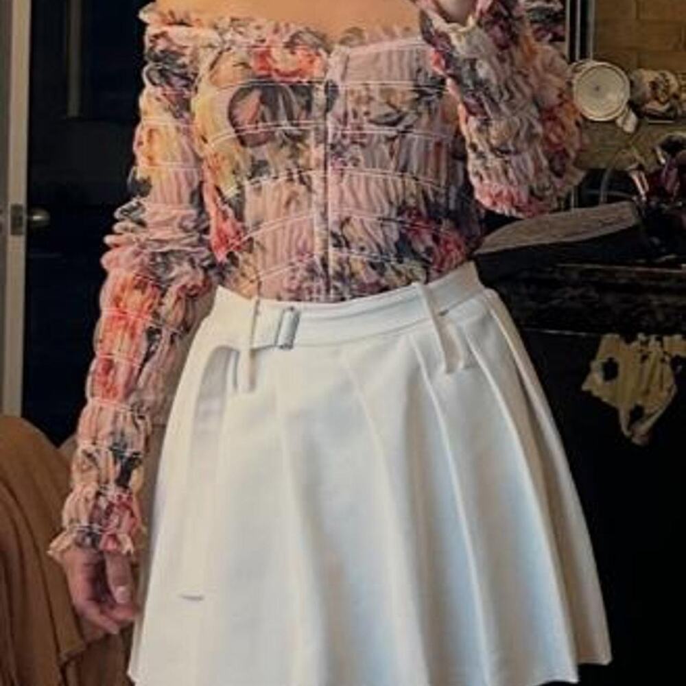 Open edit pleated belted skort